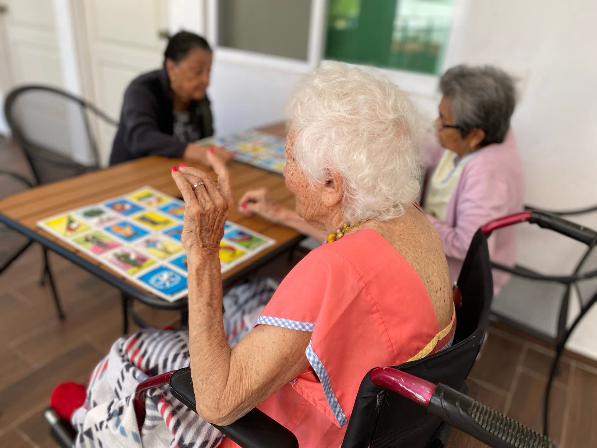 Residents enjoying board-game activities